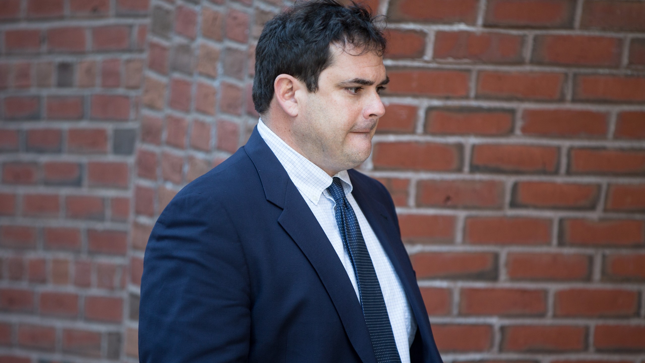 Stanford University sailing coach John Vandemoer arrives for his arraignment at Boston Federal Court on March 12, 2019 in Boston, Massachusetts. (Credit: Scott Eisen/Getty Images)