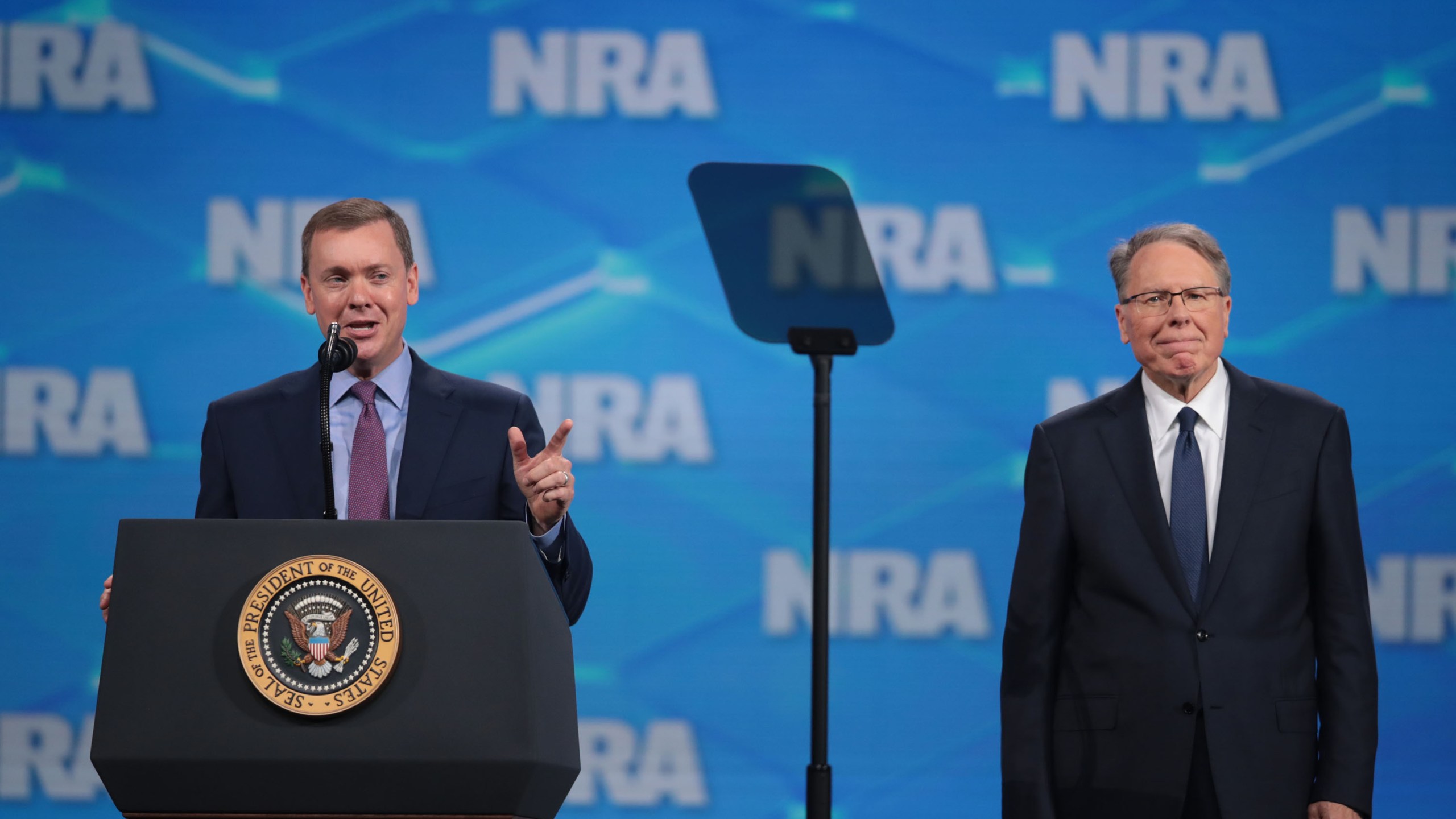 Chris Cox (L), executive director of the NRA-ILA, and Wayne LaPierre, NRA vice president and CEO, speak to guests at the NRA-ILA Leadership Forum at the 148th NRA Annual Meetings & Exhibits on April 26, 2019 in Indianapolis, Indiana. (Credit: Scott Olson/Getty Images)