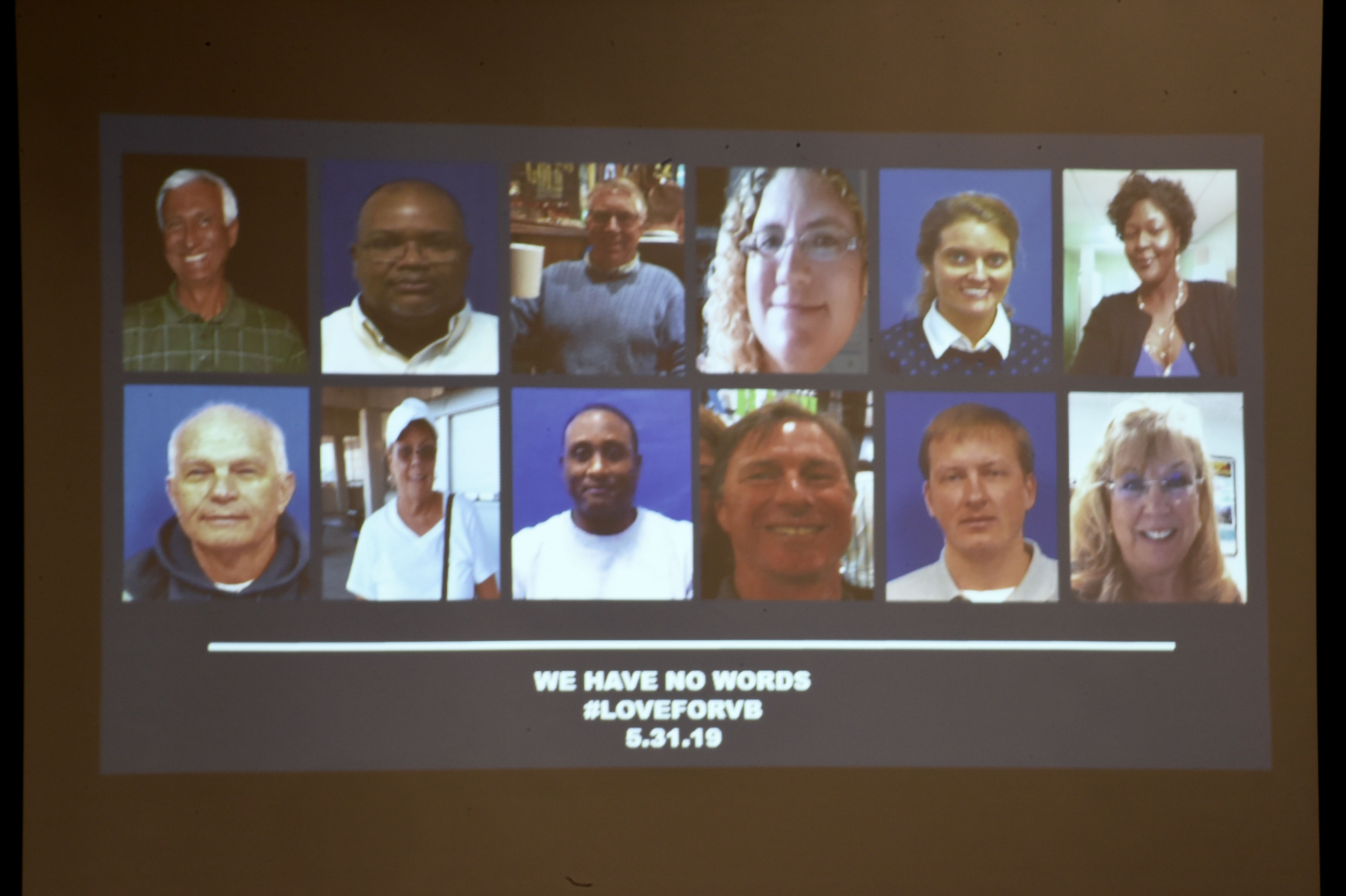 A slide of the victims in the May 31, 2019 mass shooting at a Virginia Beach, Virginia municipal building is shown during a press conference on June 1, 2019. (Credit: ERIC BARADAT/AFP/Getty Images)