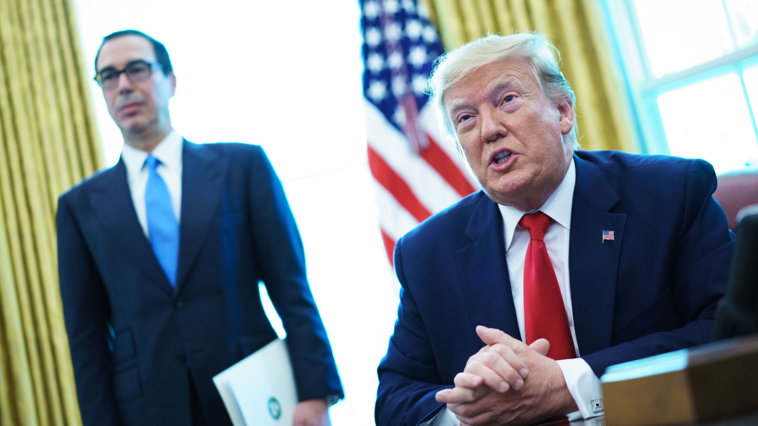 Donald Trump speaks before signing an executive order for sanctions on Iran's supreme leader in the Oval Office of the White House on June 24, 2019. (Credit: MANDEL NGAN / AFP) (Photo credit should read MANDEL NGAN/AFP/Getty Images)