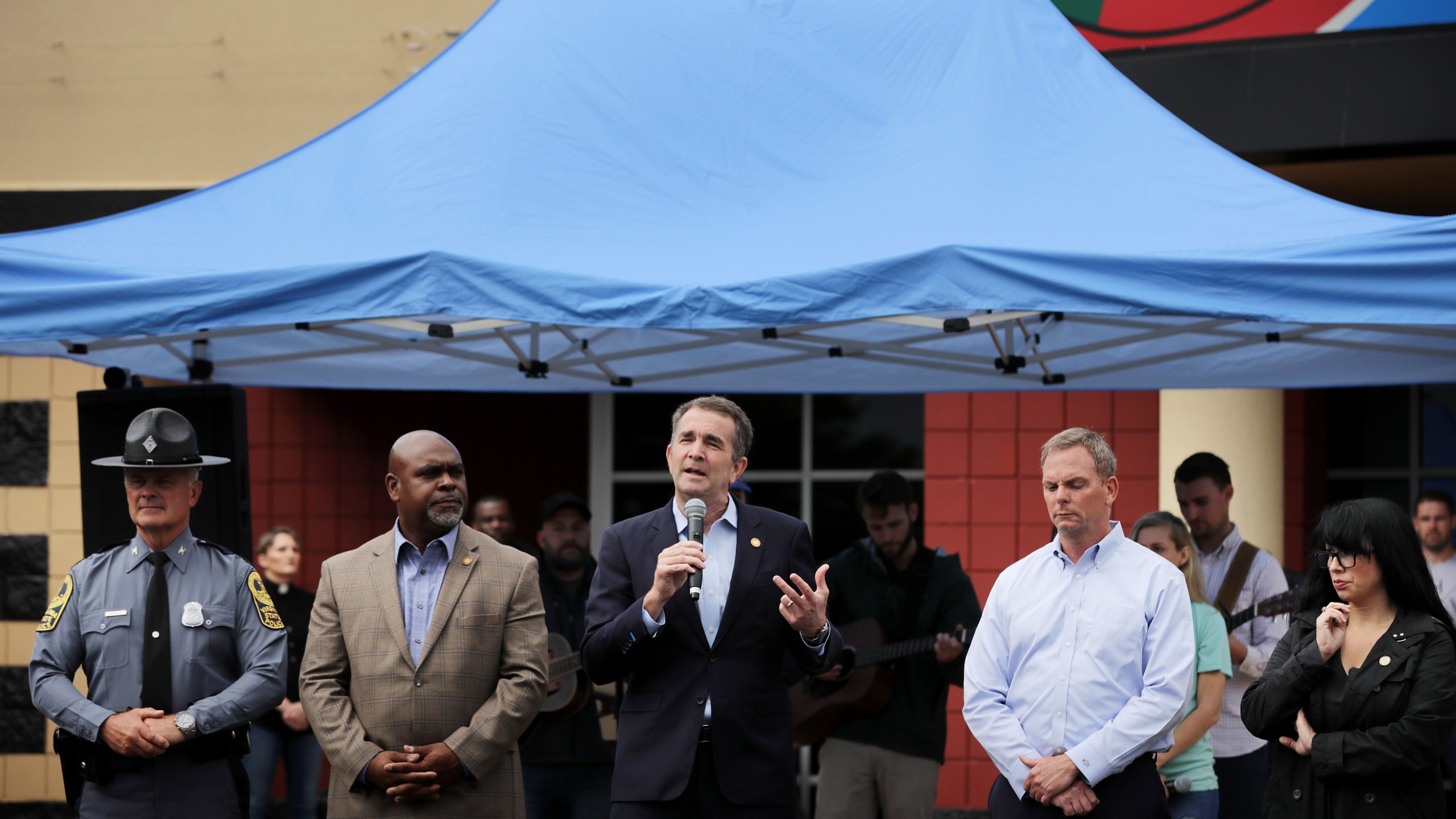 Gov. Ralph Northam, center, speaks during a public prayer service for mass shooting victims in Virginia Beach on June 1, 2019. (Credit: Chip Somodevilla/Getty Images)