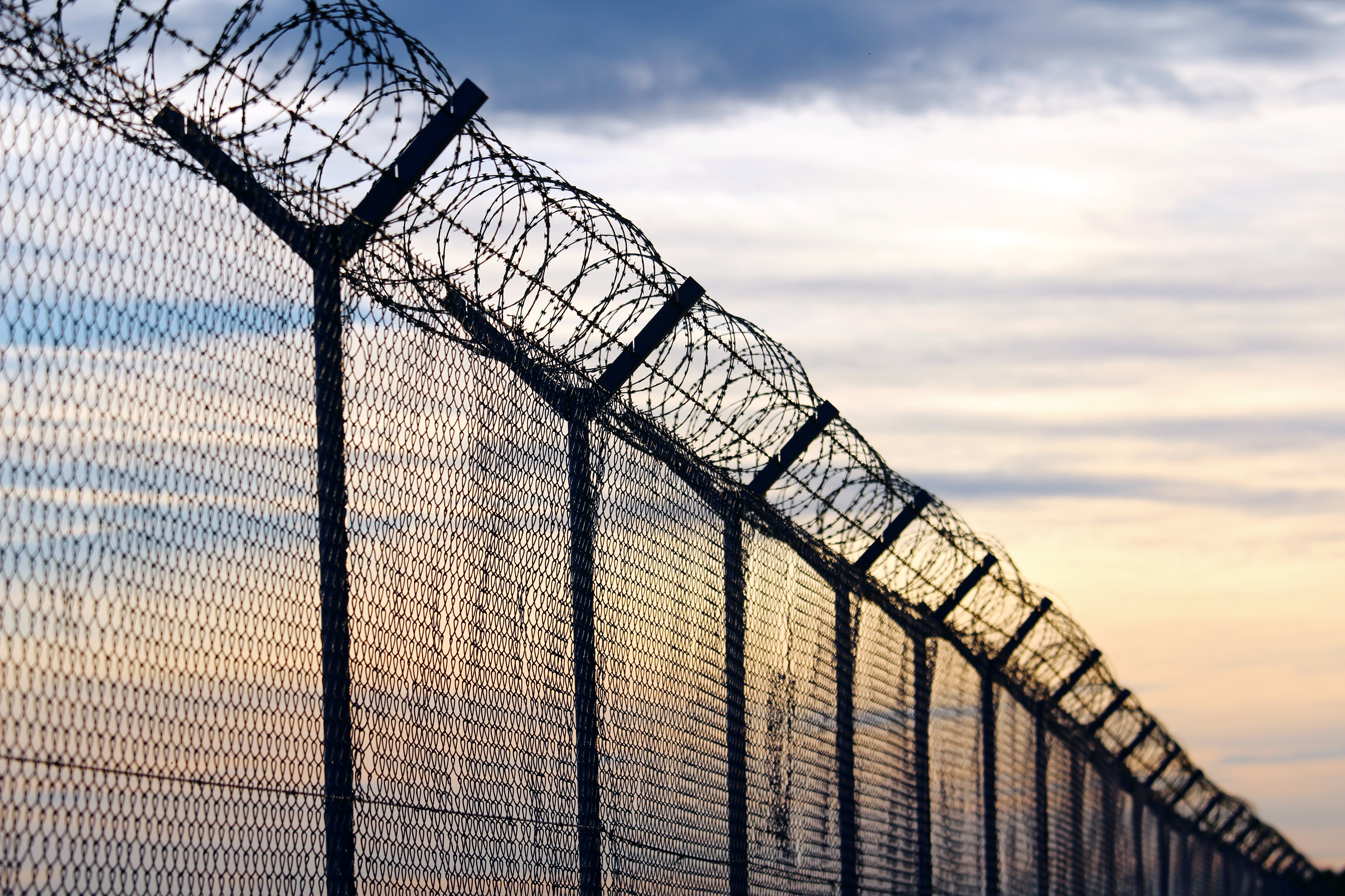 Barb wire is seen outside a prison in this file photo. (iStock / Getty Images Plus)