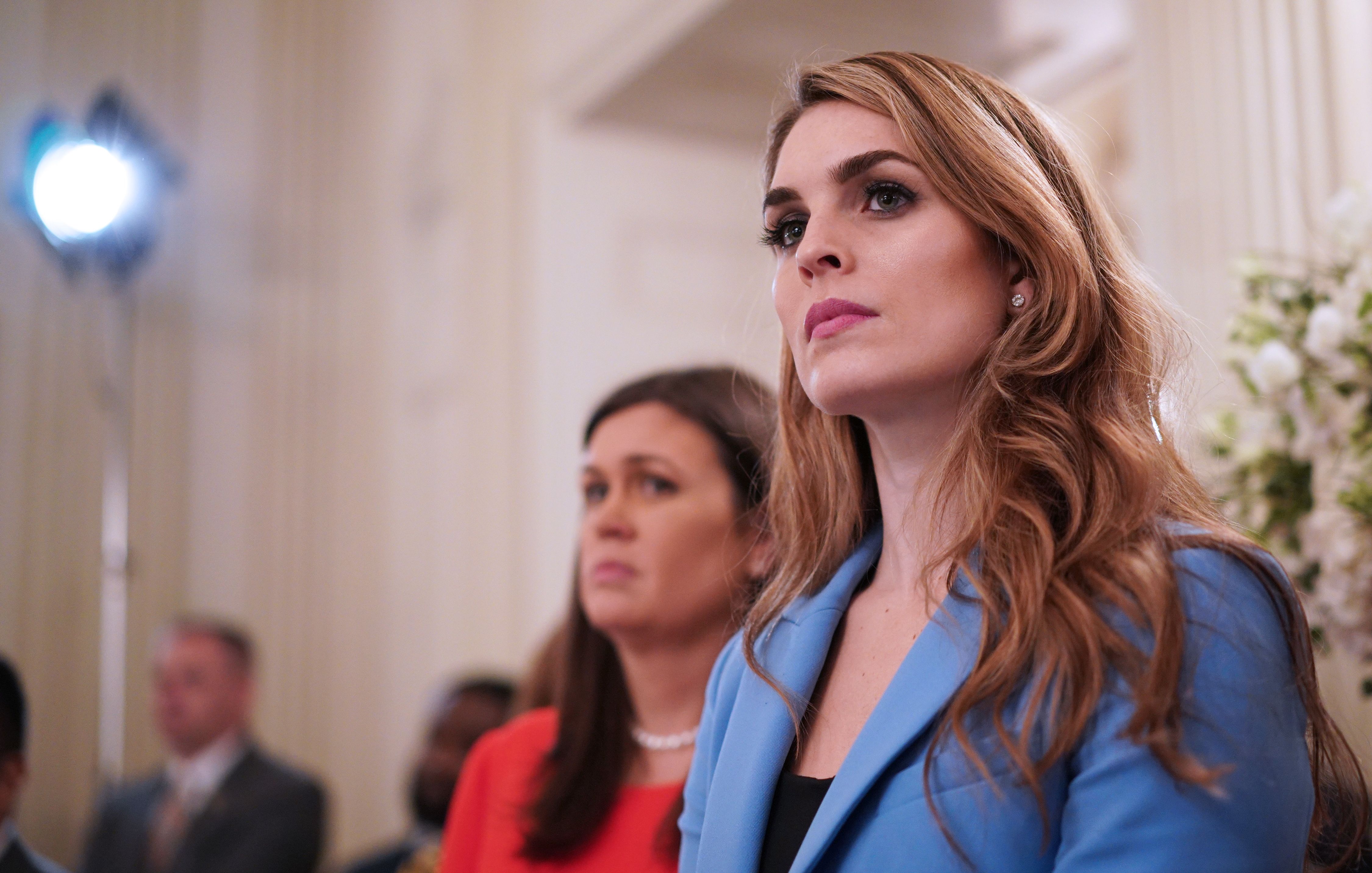 White House Communications Director Hope Hicks watches as Trump takes part in a listening session on gun violence with teachers and students in the State Dining Room of the White House on February 21, 2018. (Credit: MANDEL NGAN/AFP/Getty Images)