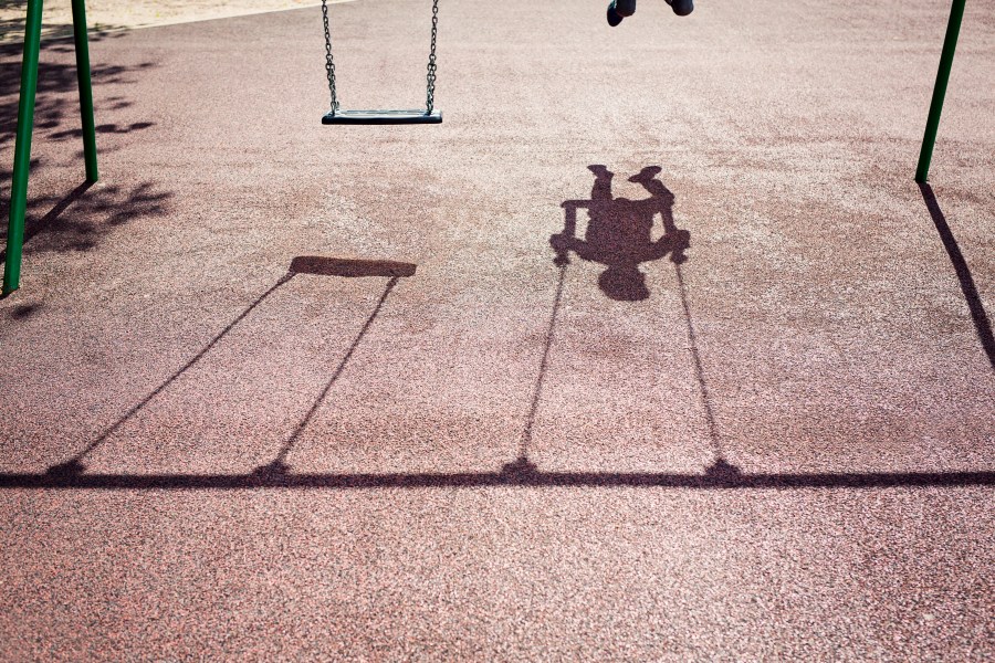 A child plays on a swing in this file photo. (Credit: Getty Images)