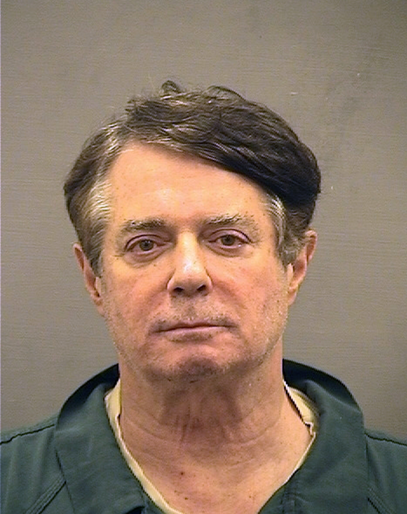 In this handout provided by Alexandria Sheriff's Office, Paul Manafort poses for a mugshot photo at the Alexandria Detention Center in Alexandria, Virgina. (Credit: Alexandria Sheriff's Office via Getty Images)