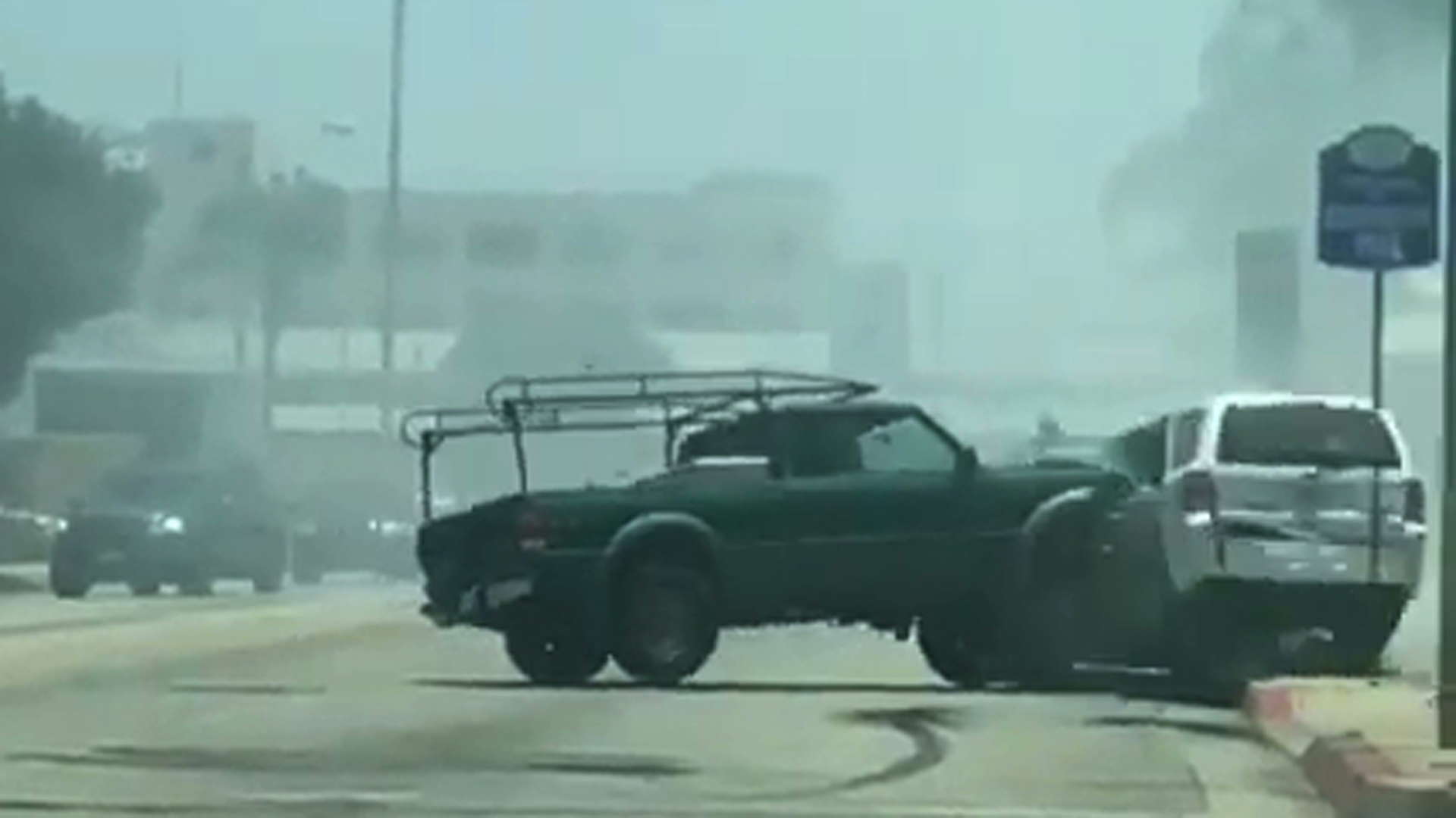 A pickup is seen after ramming into a parked SUV a second time as part of a series of crashes on June 23, 2019, in Huntington Park. (Credit: @dmnd_doom via Instagram)