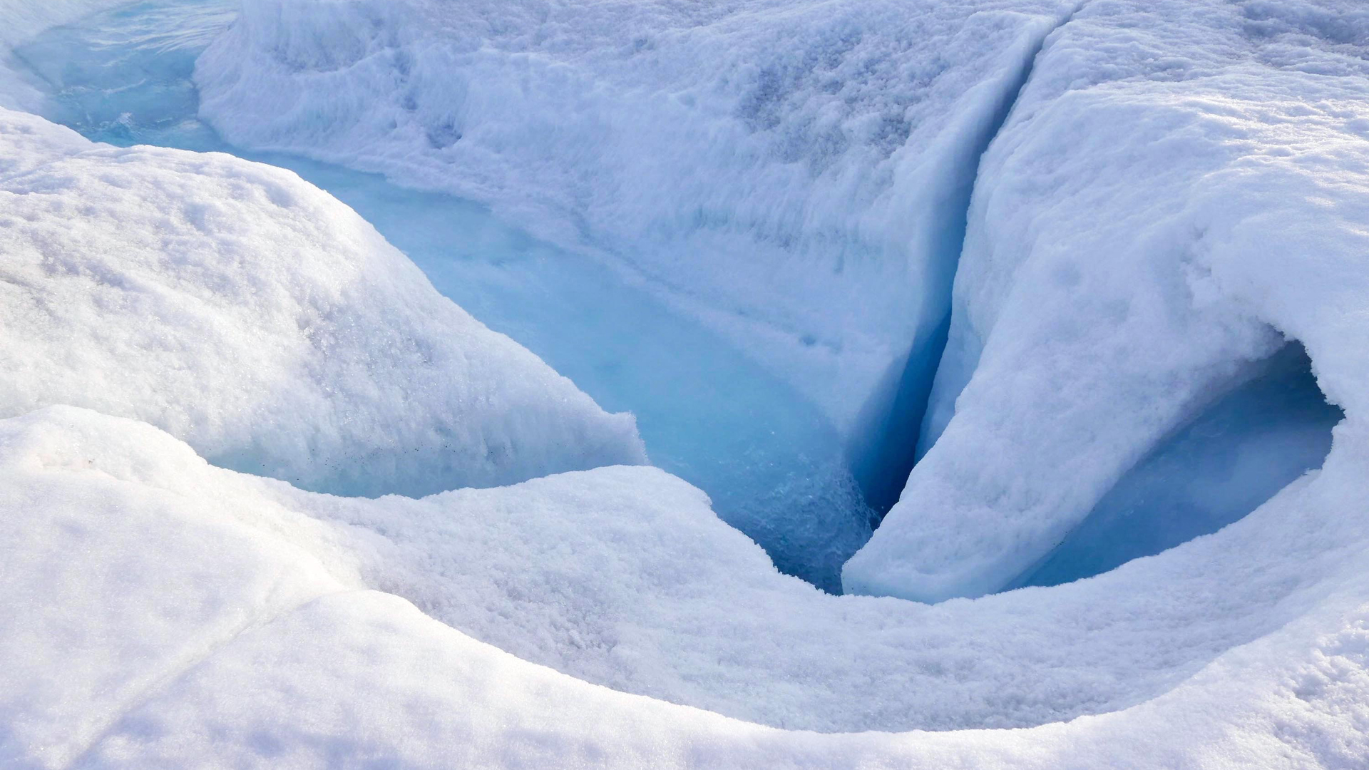 Greenland's massive ice sheets contain enough water to raise global sea levels by 23 feet, and a new study shows that they are melting at a rate "unprecedented" over centuries -- and likely thousands of years. (Credit: Christian Streib/CNN)