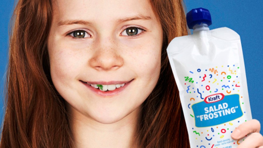 A photo of a child holding Kraft's new "salad frosting" product is seen in a photo from the company.