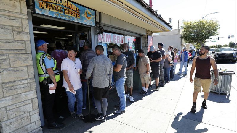 People wait in line outside of Bluebird Liquor in Hawthorne to buy Mega Millions lottery tickets in 2018. (Credit: Mel Melcon / Los Angeles Times)