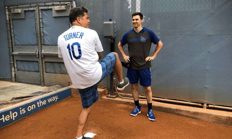 Dodgers player Ross Stripling gives KTLA's Frank Buckley some pitching advice ahead Frank's ceremonial first pitch on June 18, 2019. (Credit: KTLA)