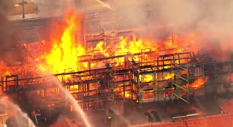 Firefighters battle a fire engulfing a condominium complex under construction in Santa Clara County on June 28, 2019. (Credit: KGO via CNN)