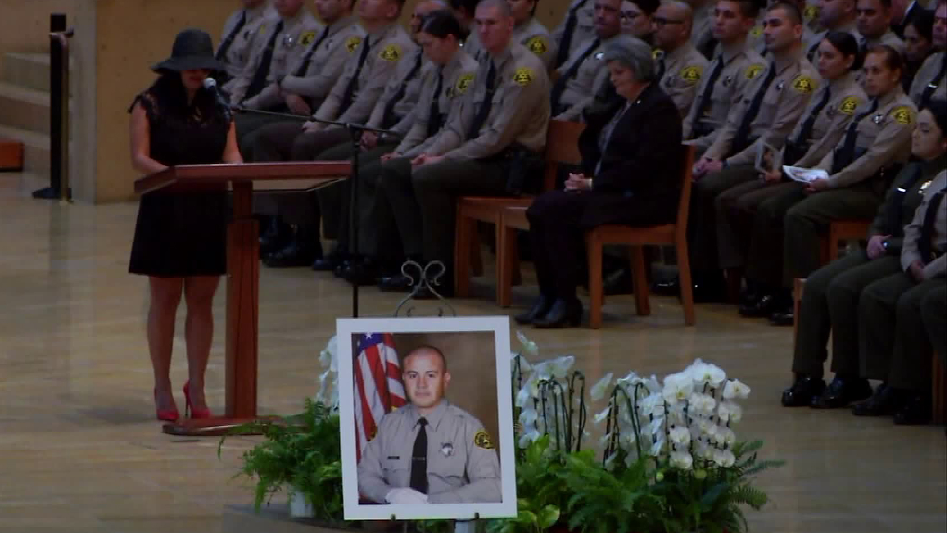 Julianna Loza delivers a eulogy at the funeral for slain L.A. County sheriff's Deputy Joseph Solano at the Cathedral of Our Lady of the Angels in downtown Los Angeles on June 24, 2019. (Credit: Pool)