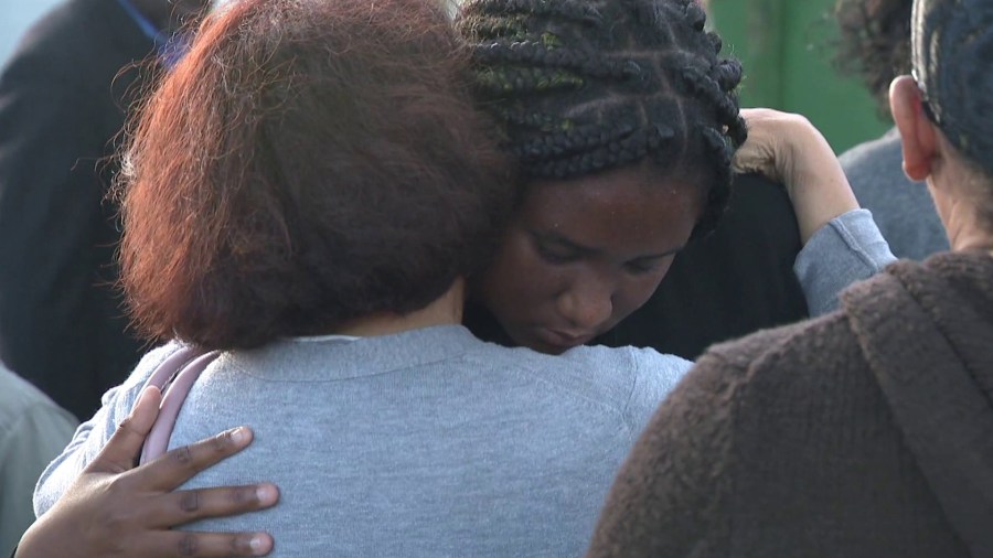 Loved ones of Kaylanaa Davis, 7, gather outside a church in Port Hueneme on July 3, 2019, after she and her pregnant mother were shot and wounded the night before. (Credit: KTLA)