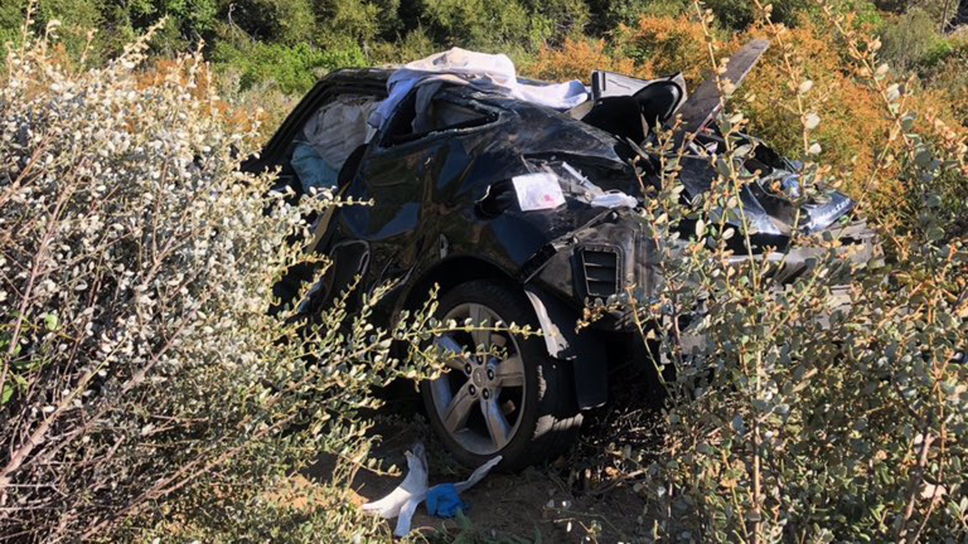 A man died when a car went over the side of a mountain road deep in the Angeles National Forest on July 26, 2019. (Credit: Los Angeles County Sheriff's Department)