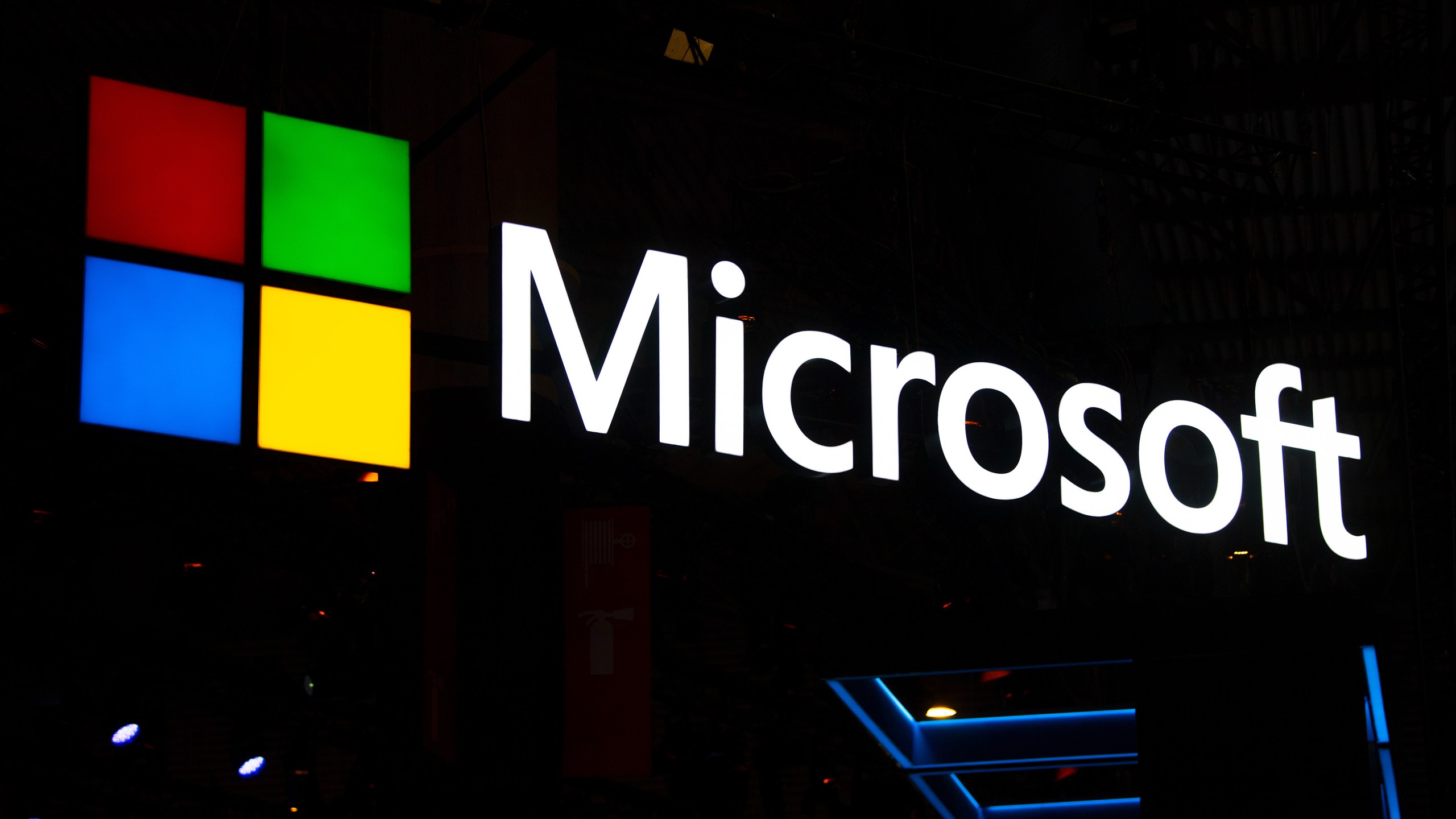 A Microsoft logo sits illuminated outside the company's booth at the GSMA Mobile World Congress in Barcelona, Spain, on Feb. 26, 2019. (Credit: David Ramos / Getty Images)