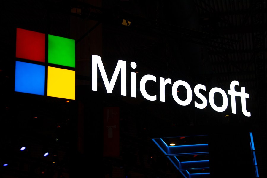 A Microsoft logo sits illuminated outside the company's booth at the GSMA Mobile World Congress in Barcelona, Spain, on Feb. 26, 2019. (Credit: David Ramos / Getty Images)