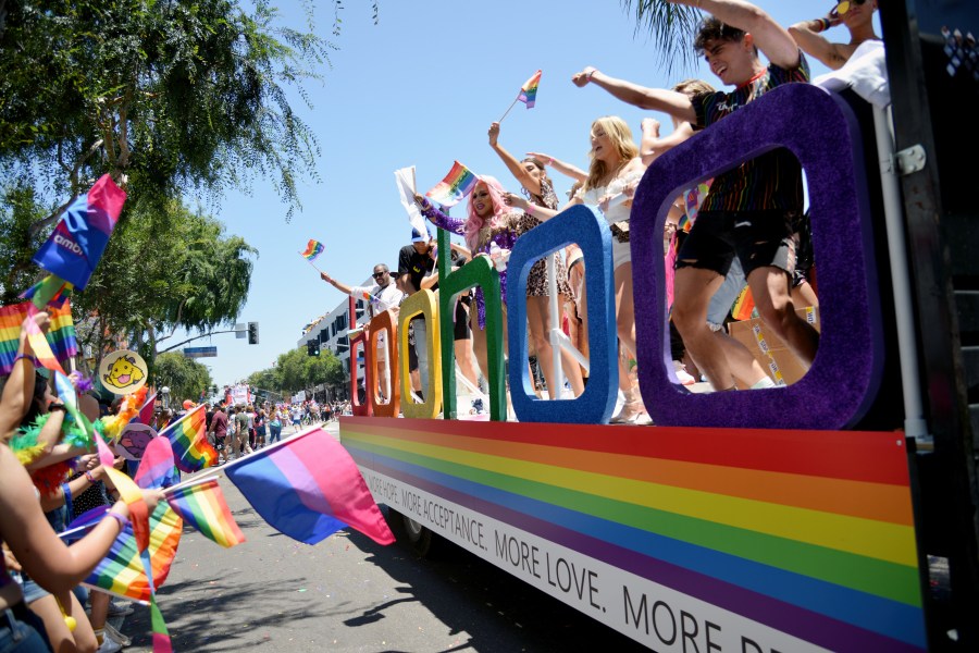 People are seen attending the L.A. Pride Parade on June 9, 2019, in West Hollywood, California. (Chelsea Guglielmino/Getty Images)