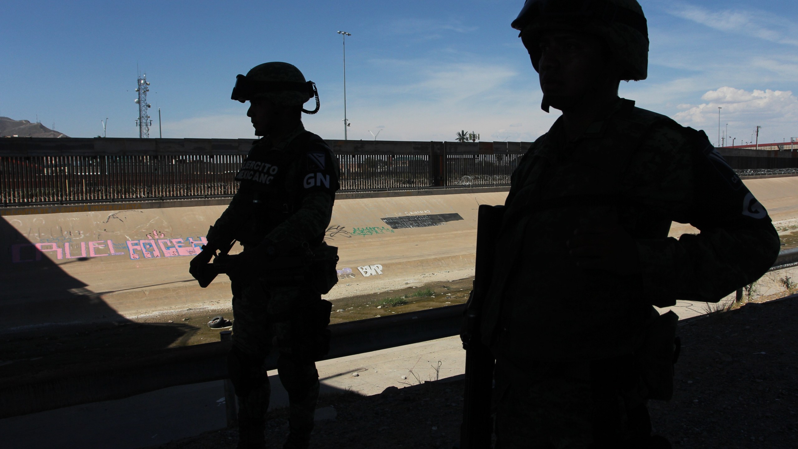 Members of the Mexican National Guard patrol the banks of the Rio Bravo river in Ciudad Juarez, Chihuahua state, Mexico, to prevent illegal crossings across the border river to El Paso Texas on July 15, 2019. (Credit: HERIKA MARTINEZ/AFP/Getty Images)