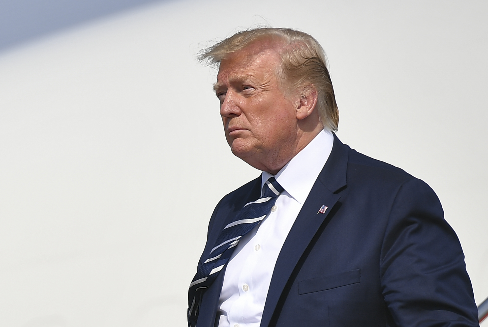 Donald Trump steps off Air Force One upon arrival at Morristown Municipal Airport in Morristown, New Jersey en route Bedminster, New Jersey on July 19, 2019. (Credit: MANDEL NGAN/AFP/Getty Images)