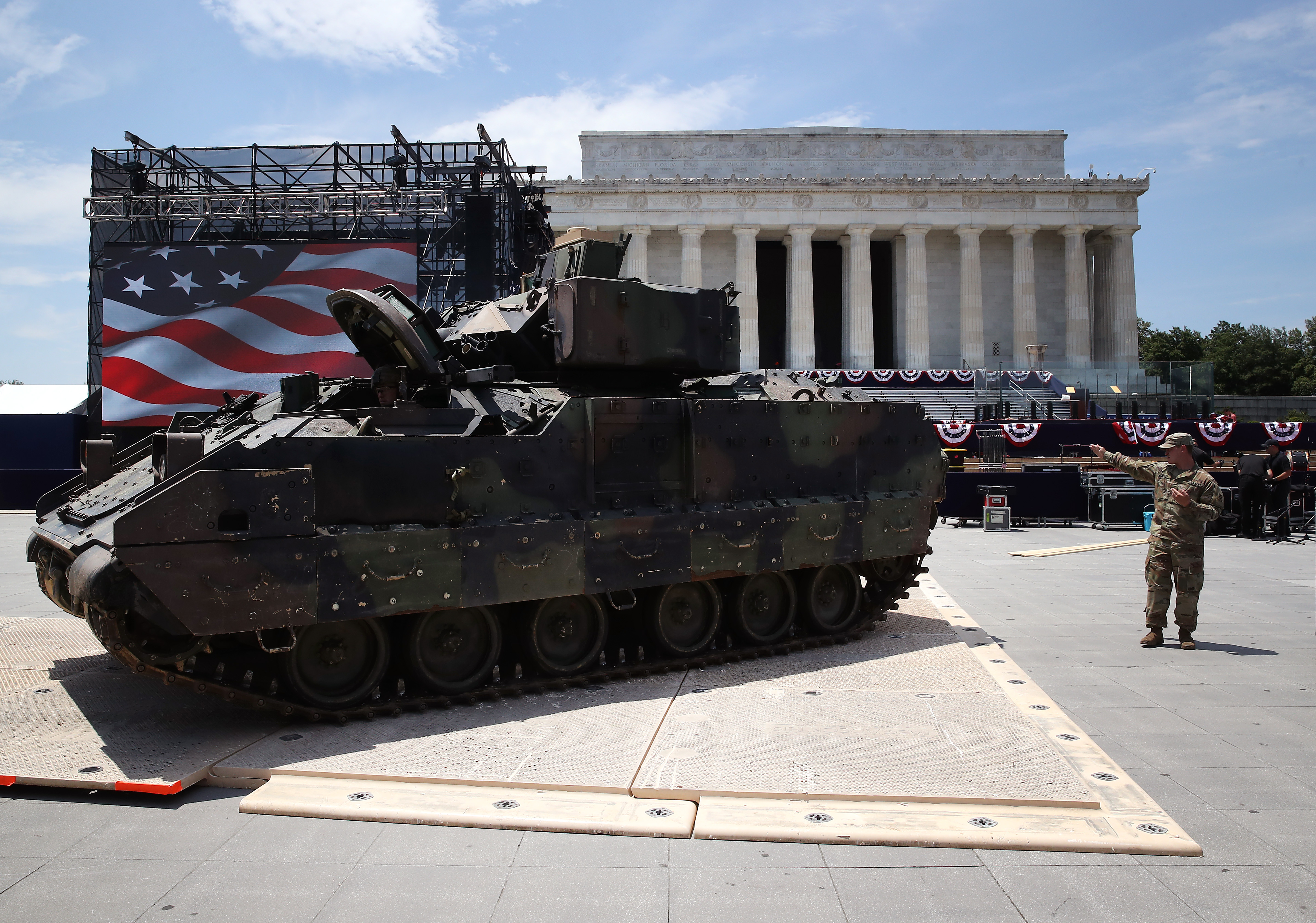 Members of the U.S. Army park an Bradley fighting vehicle in front of the Lincoln Memorial ahead of the Fourth of July "Salute to America" celebration on July 3, 2019 in Washington, DC. (Credit: Mark Wilson/Getty Images)