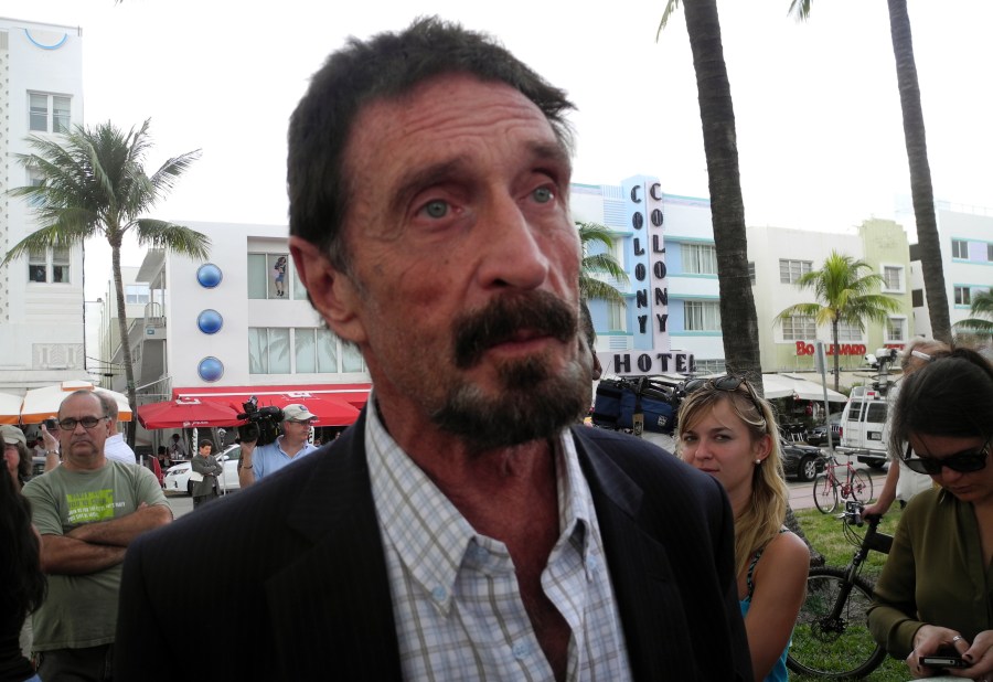 Software company founder John McAfee speaks in front of this hotel in Miami Beach, Florida on December 13, 2012, a day after being deported to US from Guatemala, where was detained for immigration violations. (Credit: PAULA BUSTAMANTE/AFP/Getty Images)