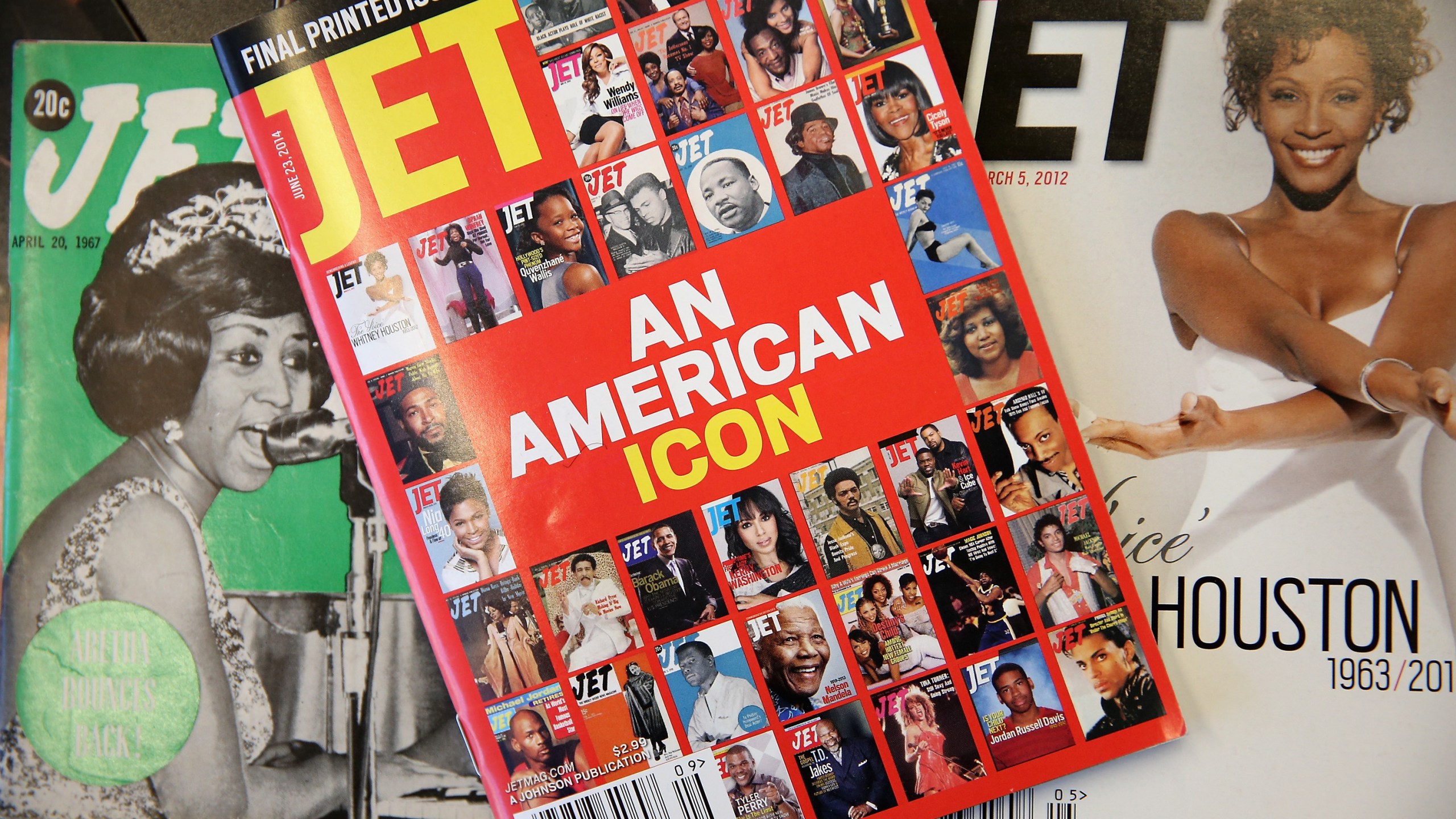 The final print edition of Jet magazine with a cover declaring it "an American icon" is displayed with vintage copies of the magazine at the Chicago offices of Johnson Publishing Company on June 9, 2014. (Credit: Scott Olson / Getty Images)