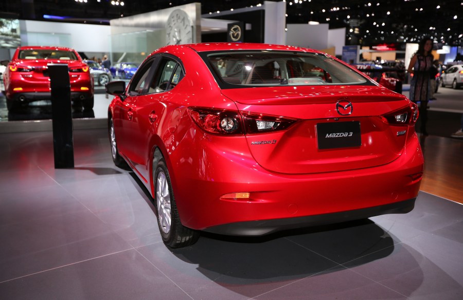 A Mazda 3 is displayed at the annual Los Angeles Auto Show on Nov. 19, 2014. (Credit: Victor Decolongon/Getty Images for Mazda Motor Co)