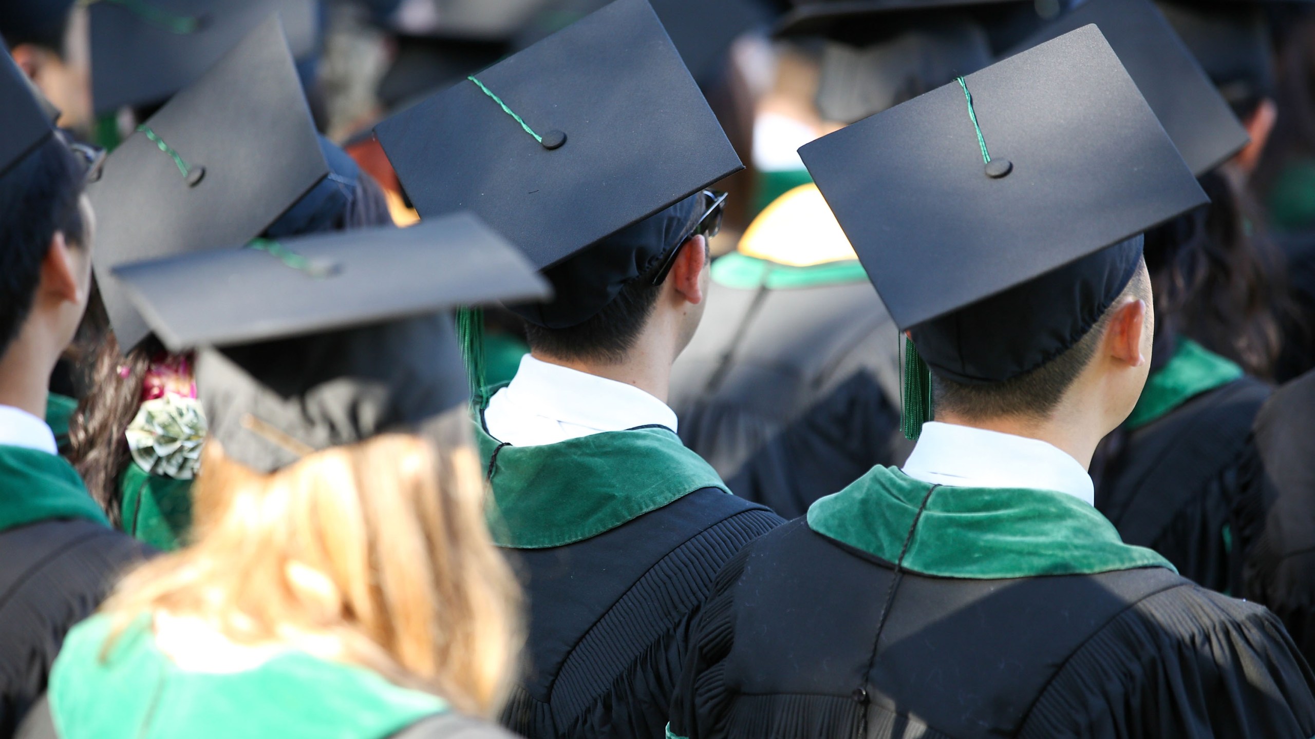 Graduates look on as the David Geffen School of Medicine at UCLA’s Hippocratic Oath Ceremony is held in Westwood on May 30, 2014. (Credit: Imeh Akpanudosen / Getty Images for UCLA)