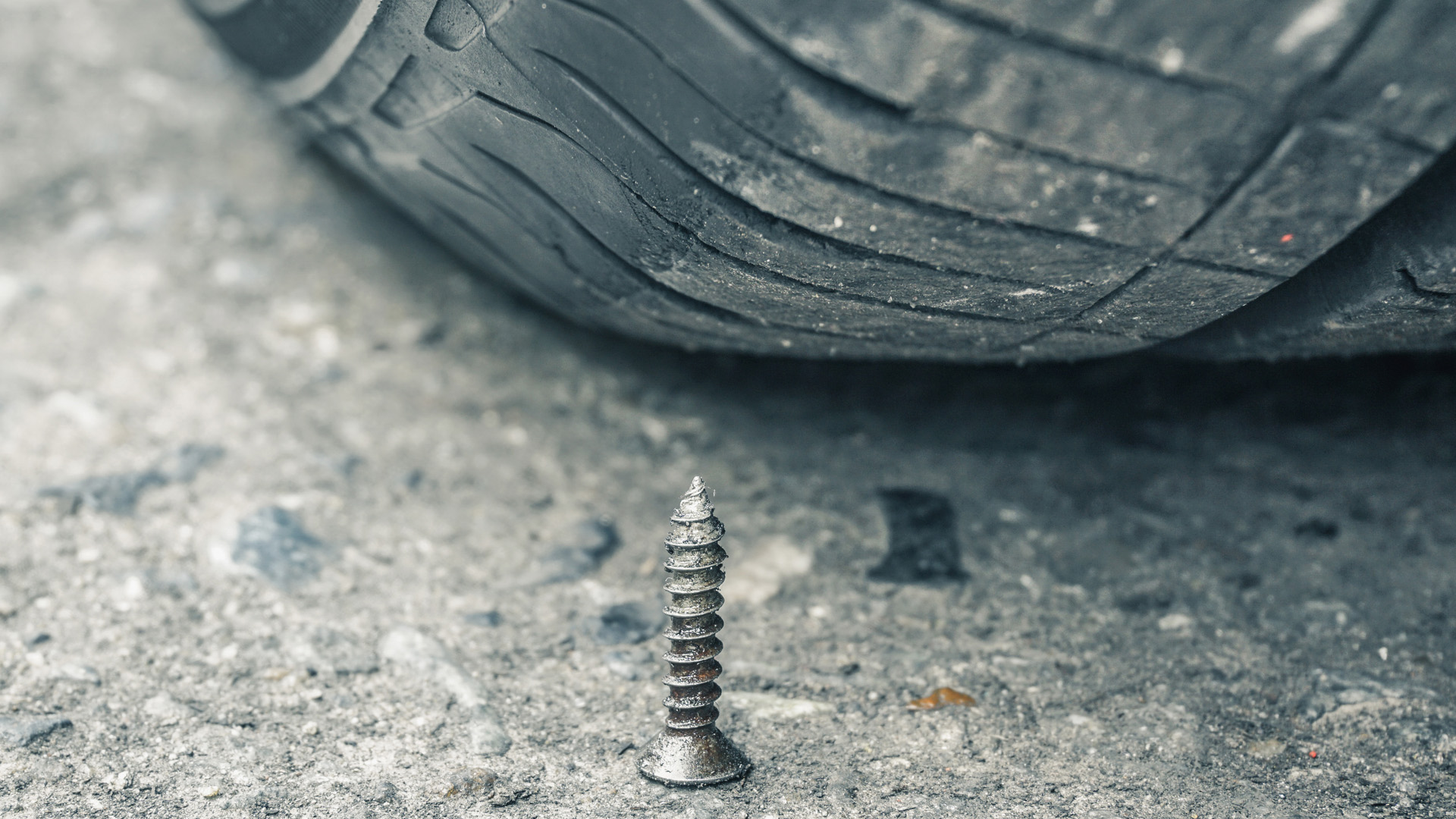 A screw is seen on a roadway in this file photo. (Getty Images)