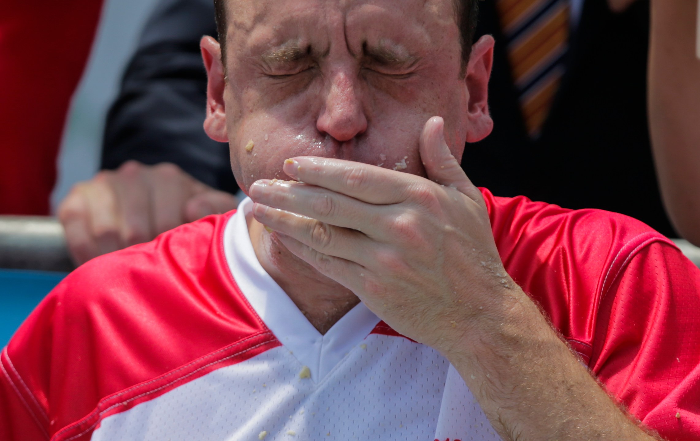 Joey Chestnut competes in the annual Nathan's Hot Dog Eating Contest on July 4, 2018 in the Coney Island neighborhood of the Brooklyn borough of New York City. (Credit: Eduardo Munoz Alvarez/Getty Images)