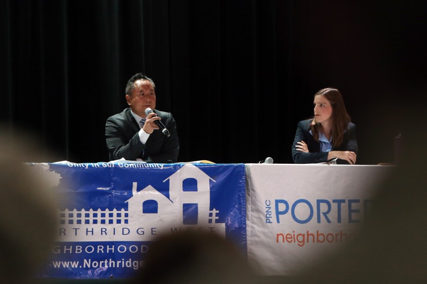 Council candidates John Lee and Loraine Lundquist appear at a town hall meeting in 2019. (Credit: Dania Maxwell / Los Angeles Times)