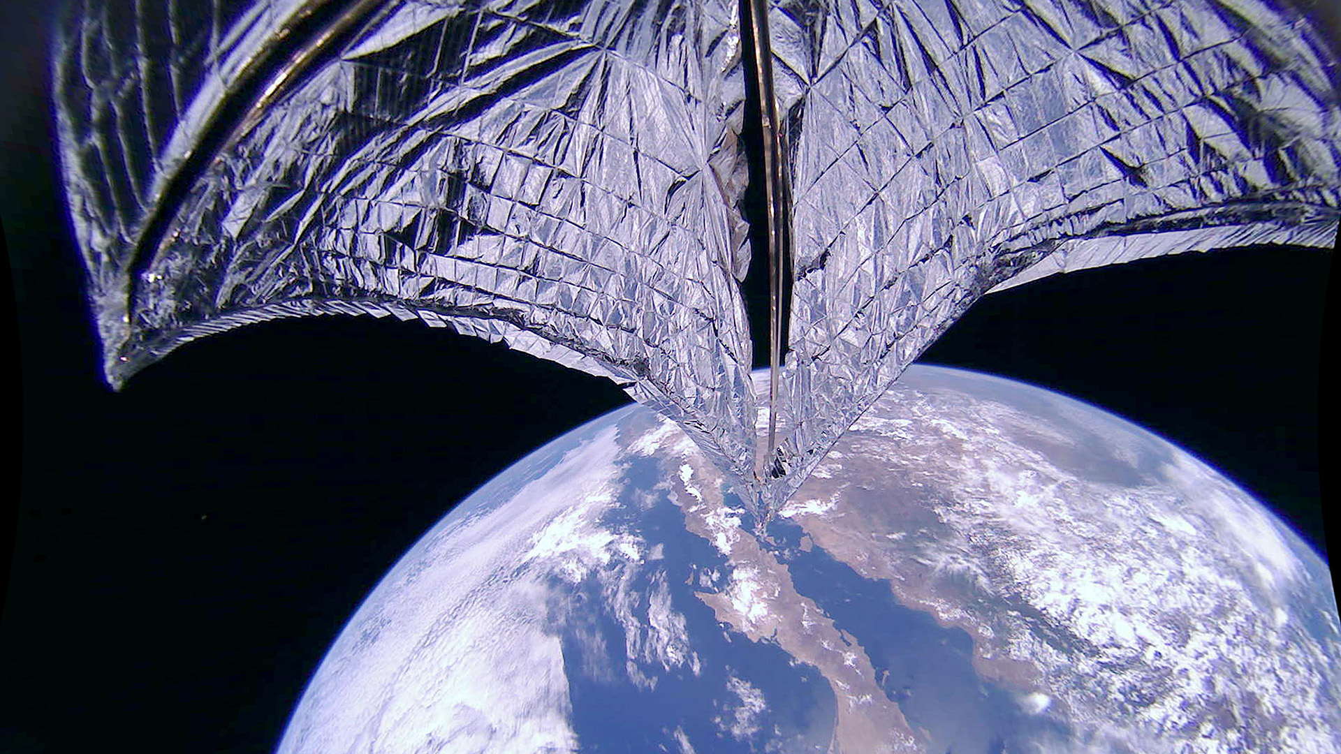 This de-distorted and cold corrected image was taken during the LightSail 2 sail deployment sequence on 23 July 2019 at 11:48 a.m. (Credit: Planetary Society)