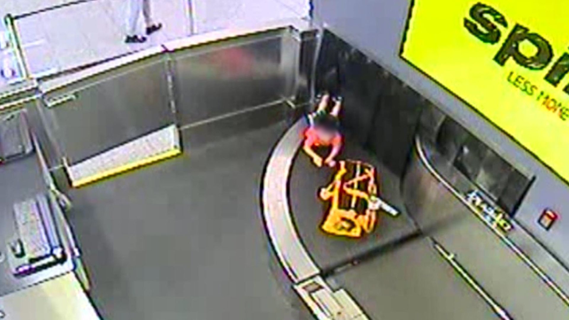 A toddler climbed onto a baggage conveyor belt behind a ticket counter at Atlanta's Hartsfield-Jackson airport. (Credit: Hartsfield-Jackson Atlanta Airport)