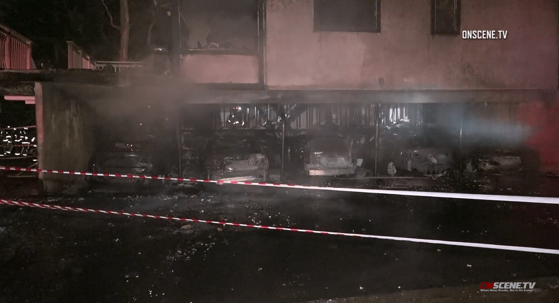 Cars are seen charred after a fire in a Huntington Beach carport on June 4, 2019. (Credit: OnScene.tc)