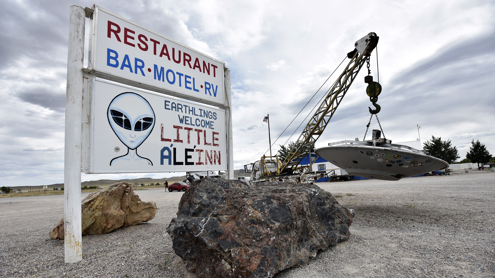 Roadside artwork featuring a tow truck and a flying saucer is displayed at the Little A'le' Inn restaurant and gift shop on July 22, 2019 in Rachel, Nevada. (Credit: David Becker/Getty Images)