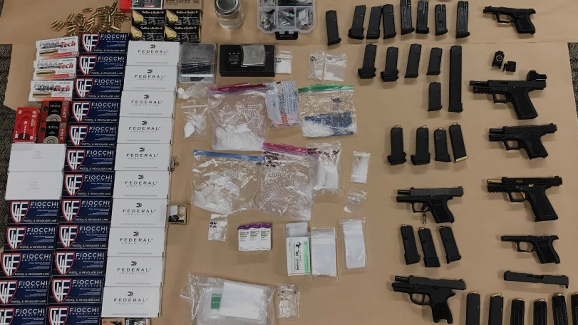 Fountain Valley police seized 6 handguns, ammunition, fentanyl, methamphetamine and other drugs from the home of a convicted felon in HuntingtonBeach onAug. 26, 2019. (Credit: Fountain Valley Police Department)