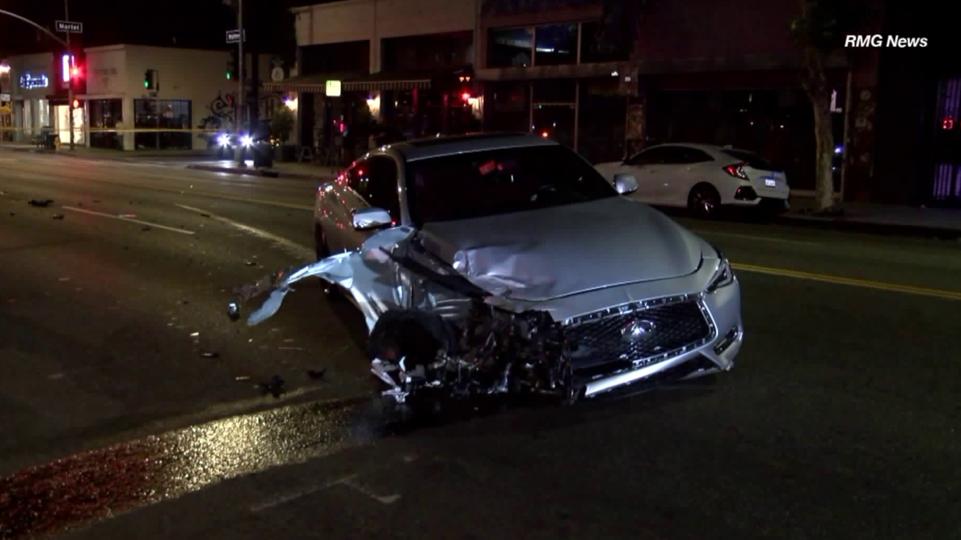 A car is seen following a deadly crash in on Melrose Avenue in Fairfax on Aug. 1, 2019. (Credit: RMG News)