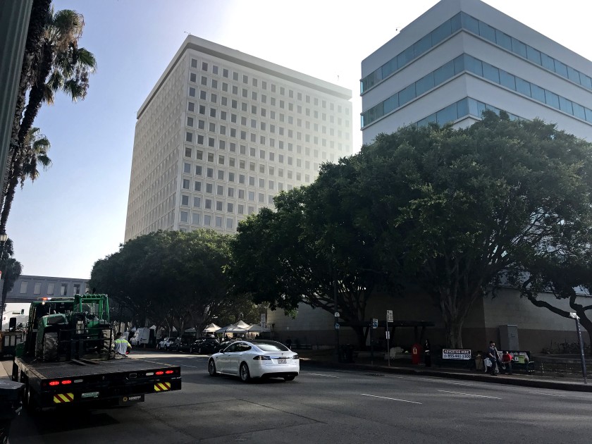 Cal/OSHA, which enforces workplace safety rules in the state, issued citations saying Los Angeles city employees were exposed to unsanitary conditions on the walkways outside City Hall East, seen in background on the left in this undated photo.(Credit: David Zahniser / Los Angeles Times)