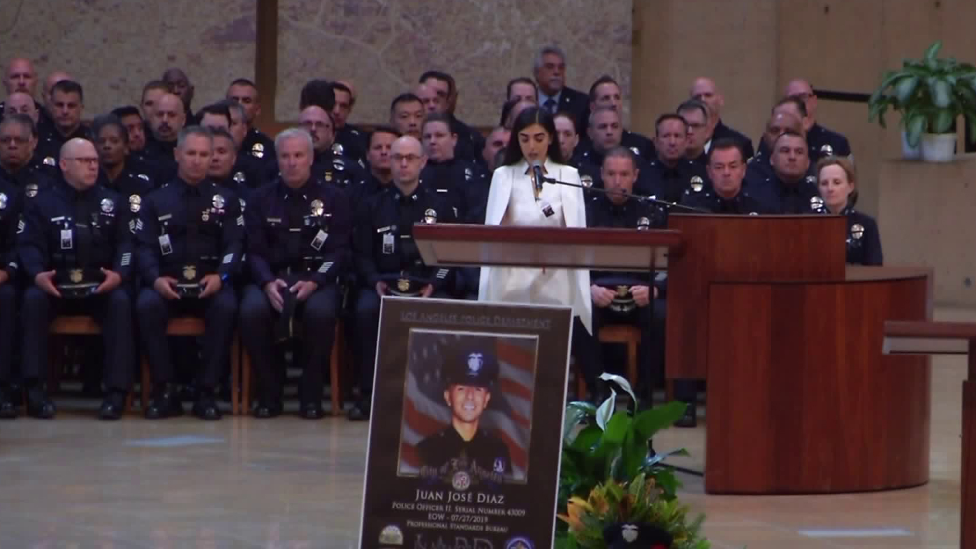 One of the sisters of slain LAPD Officer Juan Diaz speaks at a memorial service held Aug. 12, 2019, at Cathedral of Our Lady of the Angels in downtown Los Angeles. (Credit KTLA)