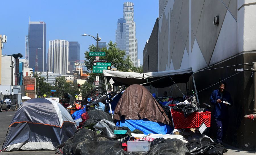 Belongings of the homeless are seen on a downtown L.A. sidewalk on Skid Row on May 30, 2019. (Credit: FREDERIC J. BROWN/AFP/Getty Images)