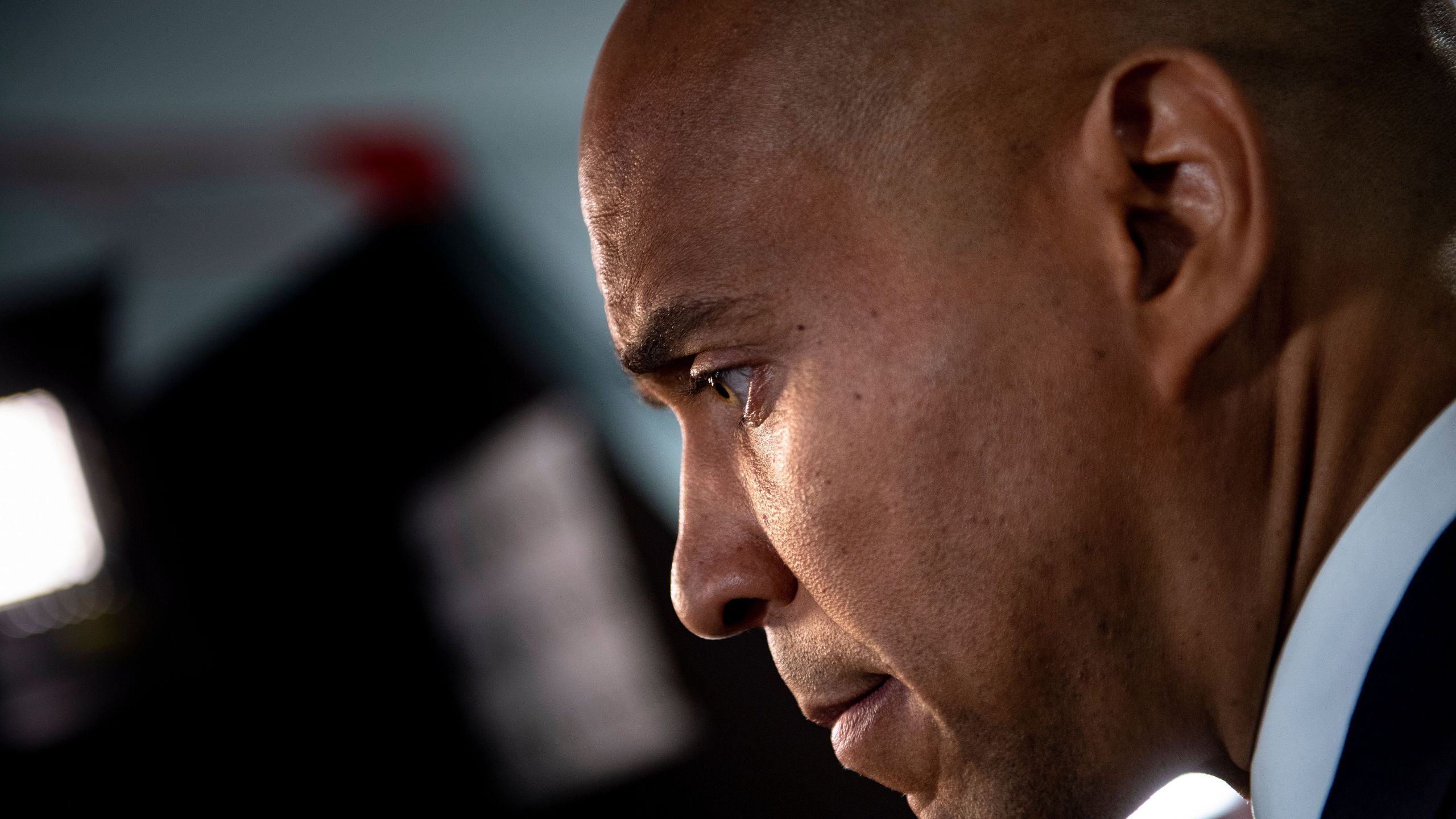 Cory Booker speaks to reporters in Detroit, Michigan on July 31, 2019. (Credit: Brendan Smialowski/AFP/Getty Images)