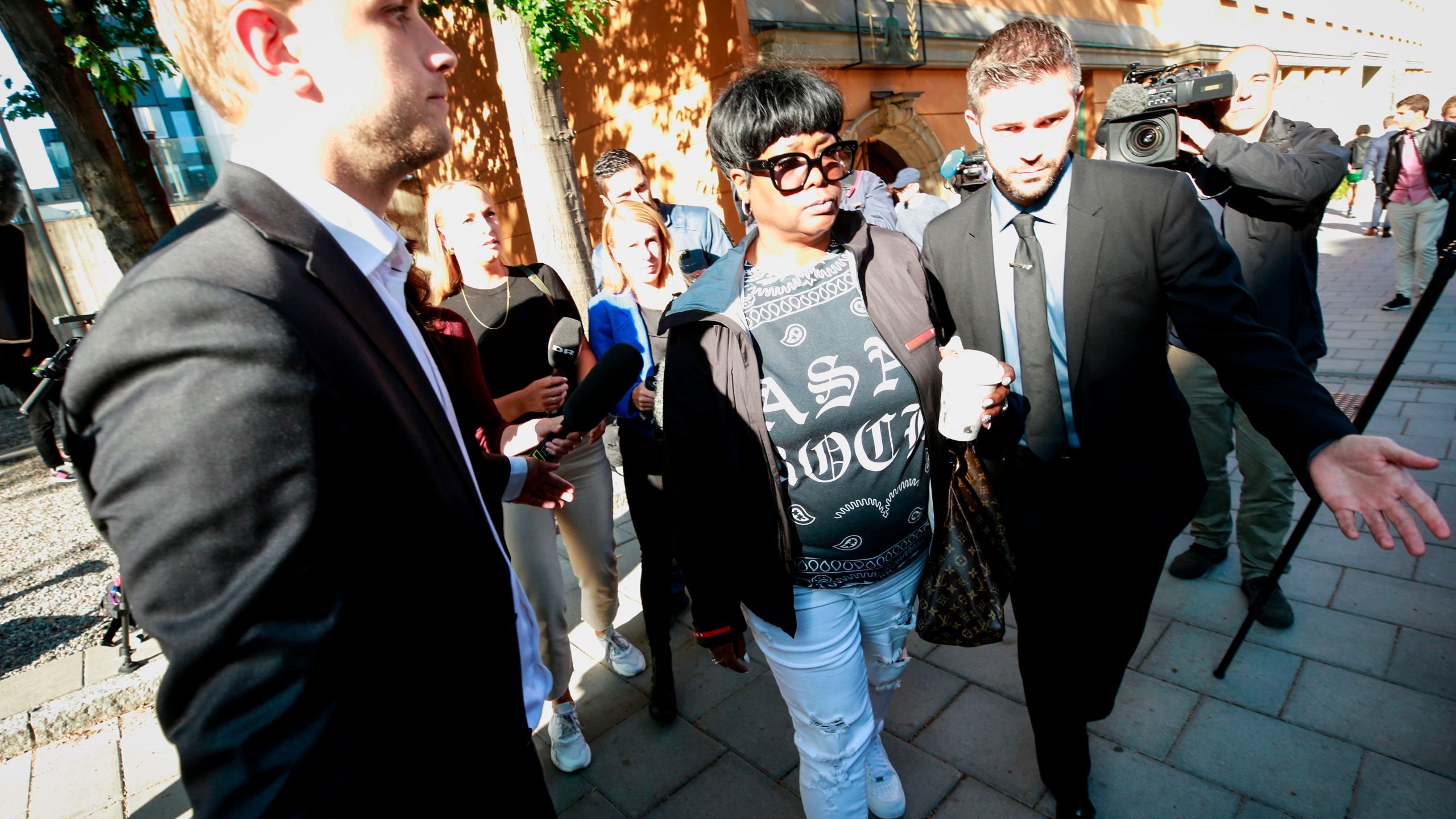 Renee Black (left), the mother of rapper A$AP Rocky leaves the district court after the second day of the rapper's trial over a June street brawl on Aug. 1, 2019 in Stockholm. (Credit: FREDRIK PERSSON/AFP/Getty Images)