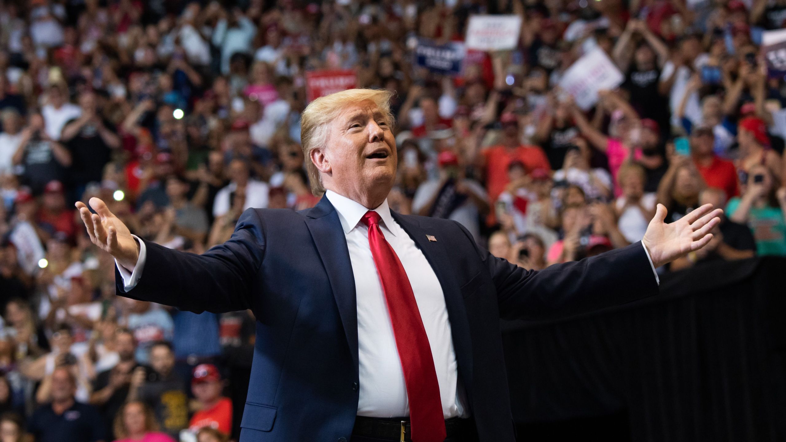 Donald Trump gestures as he arrives to a "Make America Great Again" campaign rally in Cincinnati on Aug. 1, 2019. (Credit: SAUL LOEB/AFP/Getty Images)