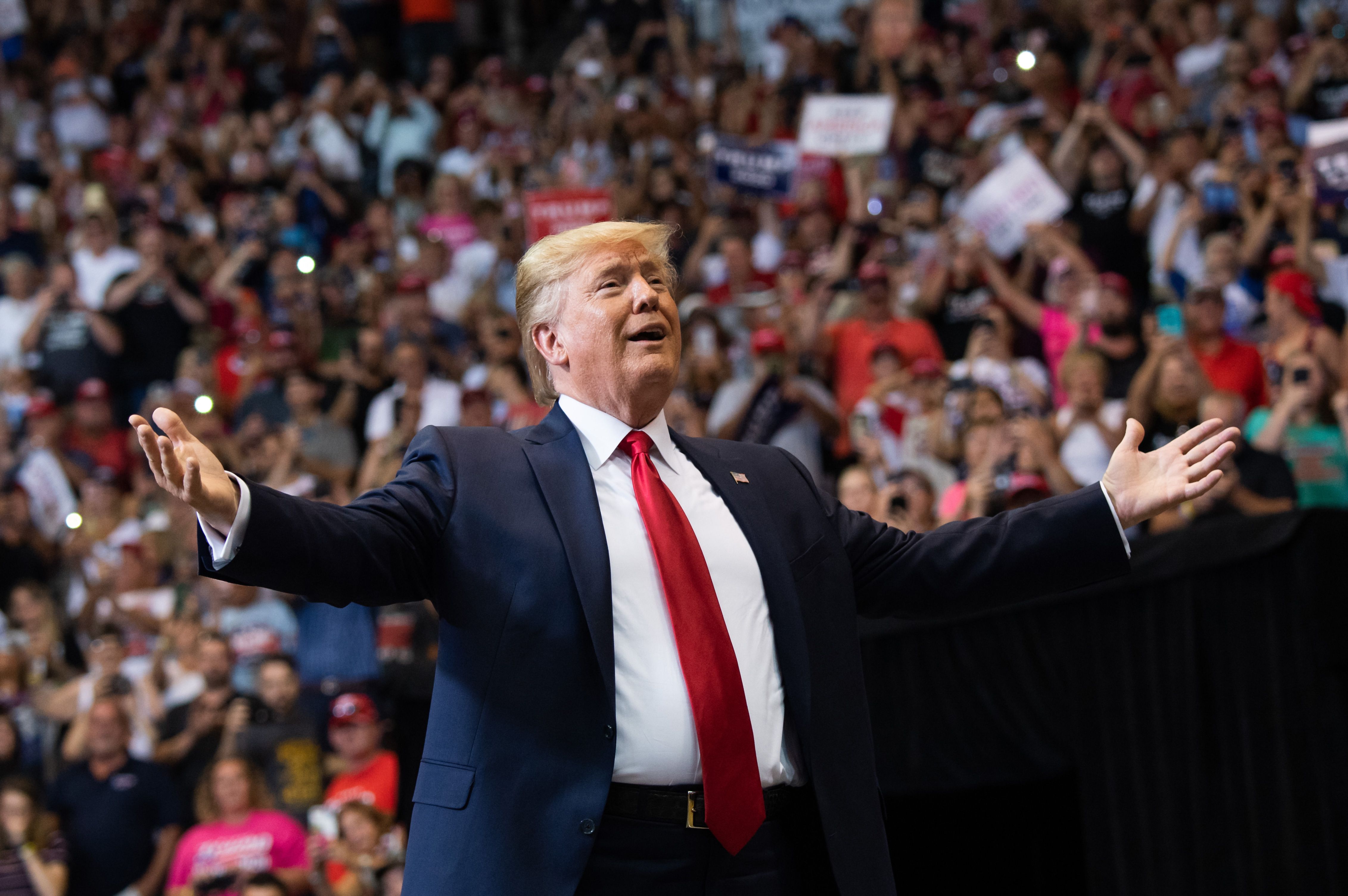 Donald Trump gestures as he arrives to a "Make America Great Again" campaign rally in Cincinnati on Aug. 1, 2019. (Credit: SAUL LOEB/AFP/Getty Images)