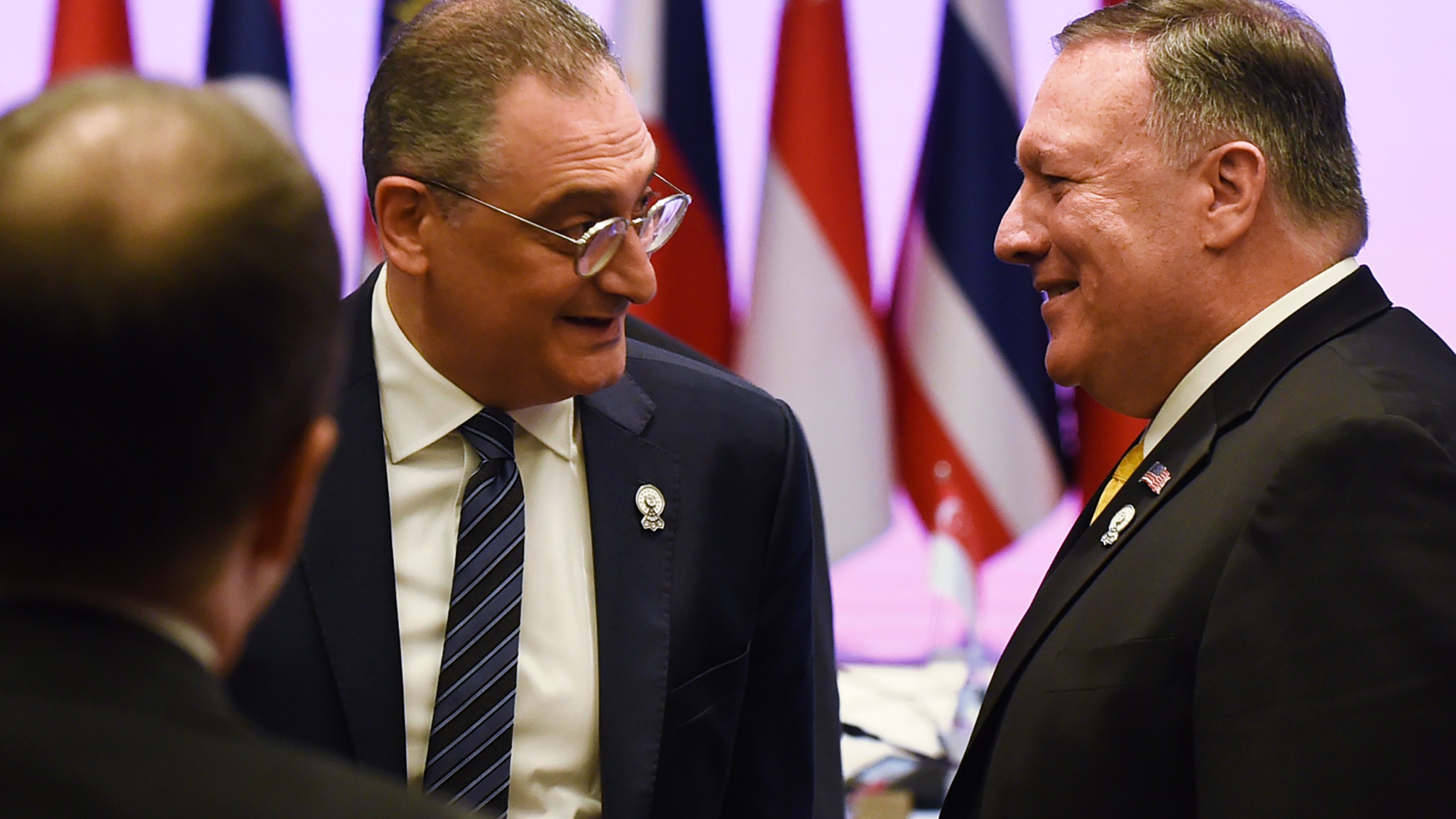 Mike Pompeo, right, speaks to Russia's Deputy Foreign Minister Igor Morgulov during the East Asia Summit Foreign Ministers' Meeting on the sidelines of the 52nd Association of Southeast Asian Nations (ASEAN) Foreign Ministers' Meeting in Bangkok on Aug. 2, 2019. (Credit: ROMEO GACAD/AFP/Getty Images)