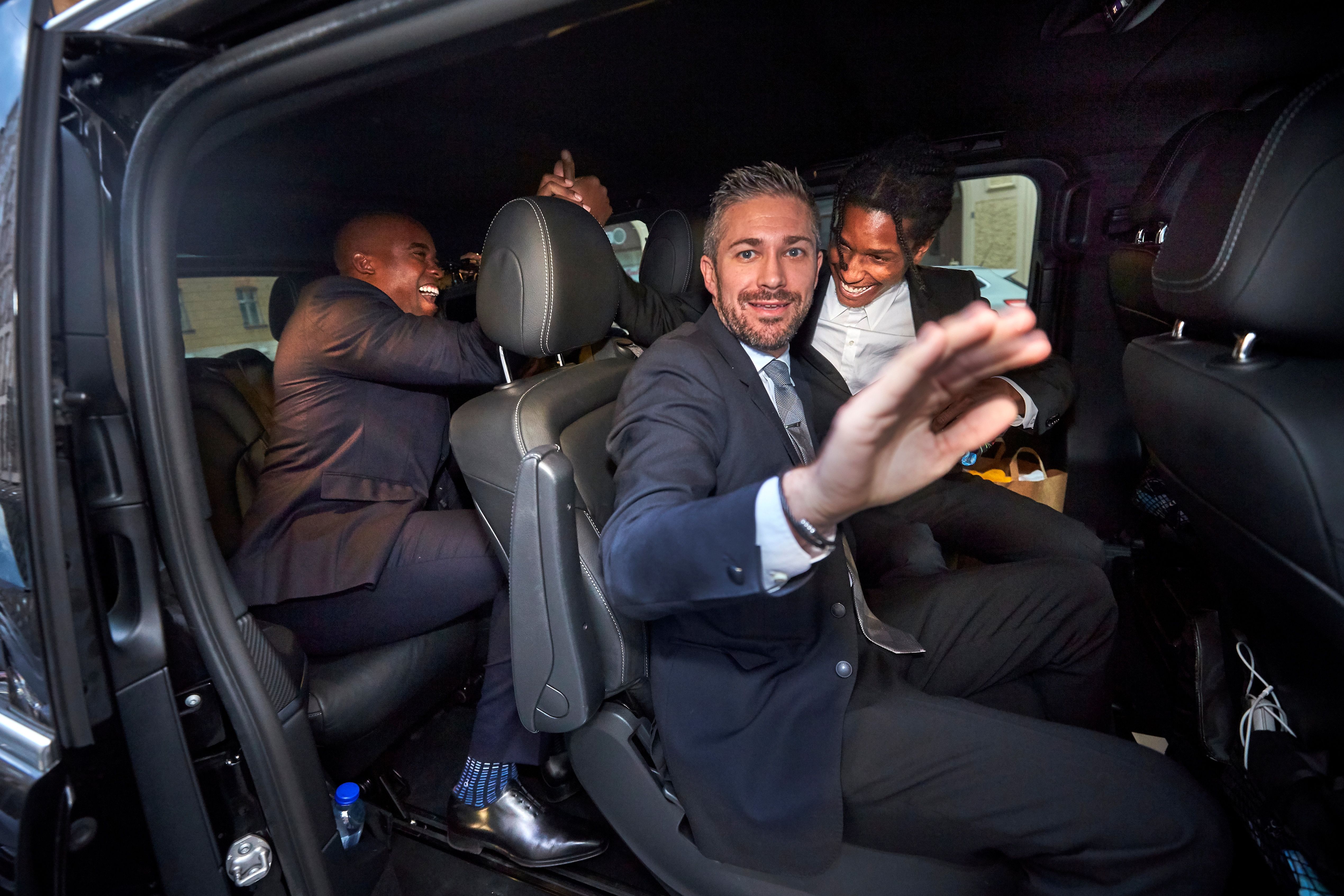 Rapper A$AP Rocky, on the right, leaves the district court after being told he will be released from custody on Aug. 2, 2019, in Stockholm. (Credit: Fredrik Persson/AFP/Getty Images)