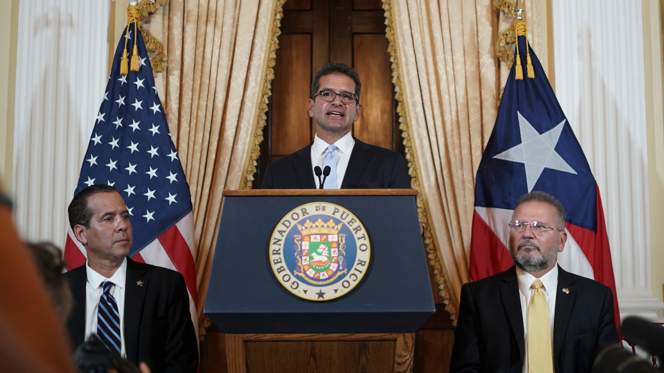 Pedro Pierluisi holds a press conference after being sworn in as governor of Puerto Rico in San Juan, Puerto Rico on, Aug. 2, 2019. (Credit: ERIC ROJAS/AFP/Getty Images)