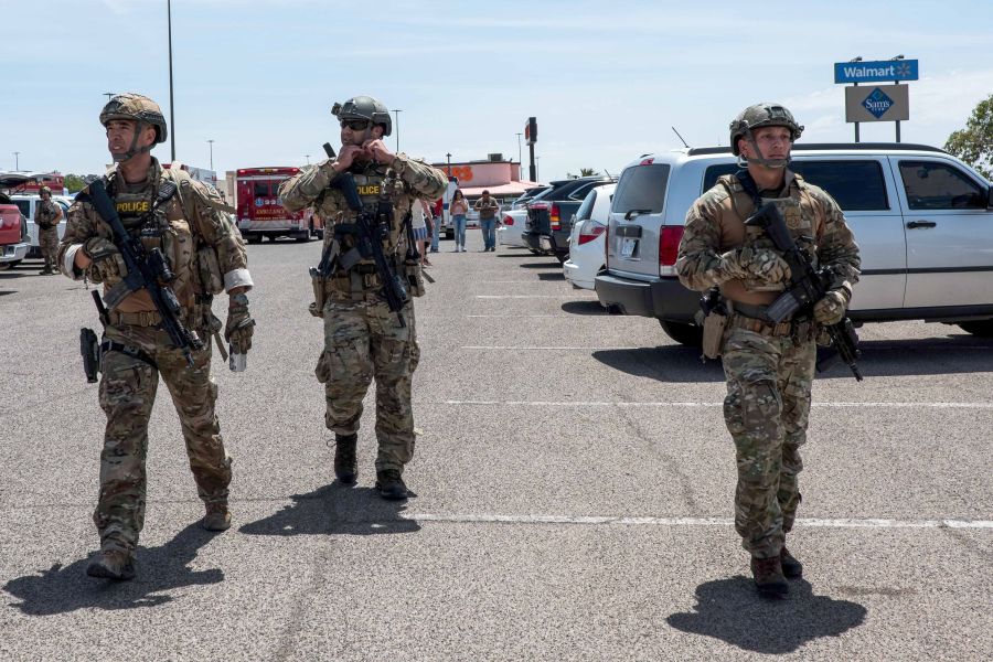 Law enforcement responds to a Walmart in El Paso, Texas, where a gunman killed 22 people on Aug. 3, 2019. (Credit: Joel Angel Juarez / AFP / Getty Images)