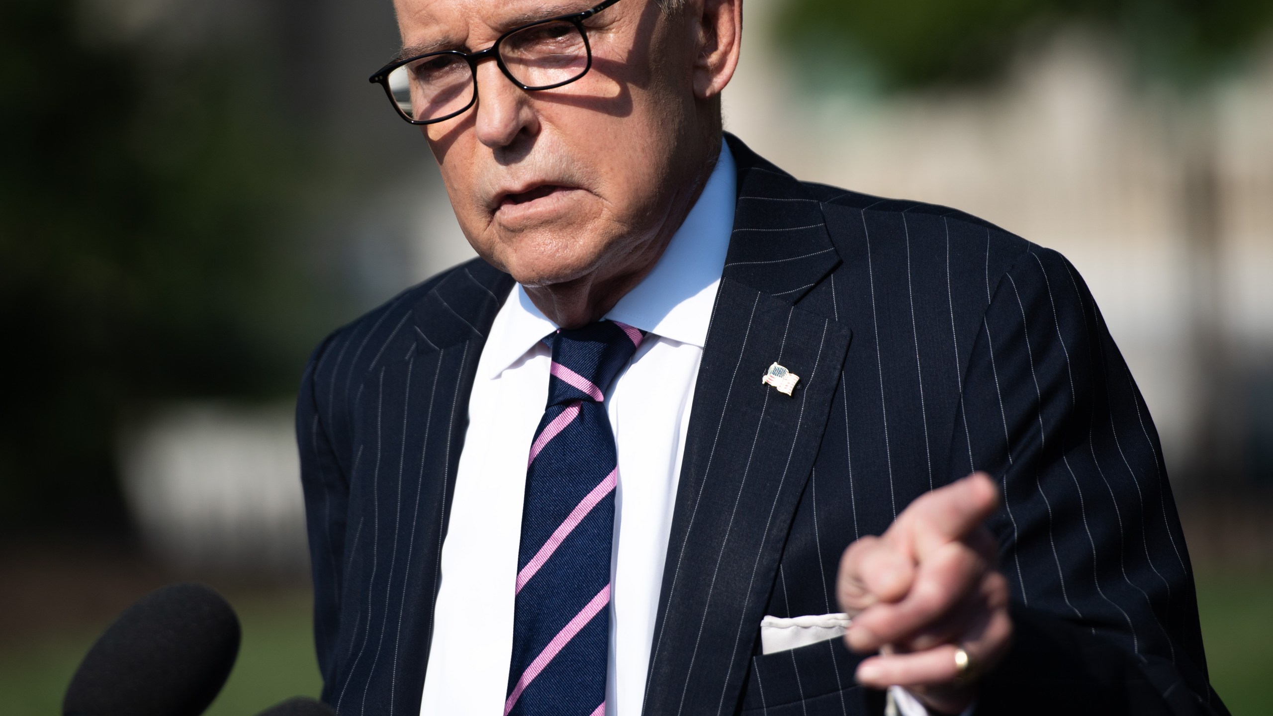 White House economic adviser Larry Kudlow speaks to the media on the driveway of the White House in Washington, D.C., on Aug. 6, 2019. (Credit: SAUL LOEB/AFP/Getty Images)