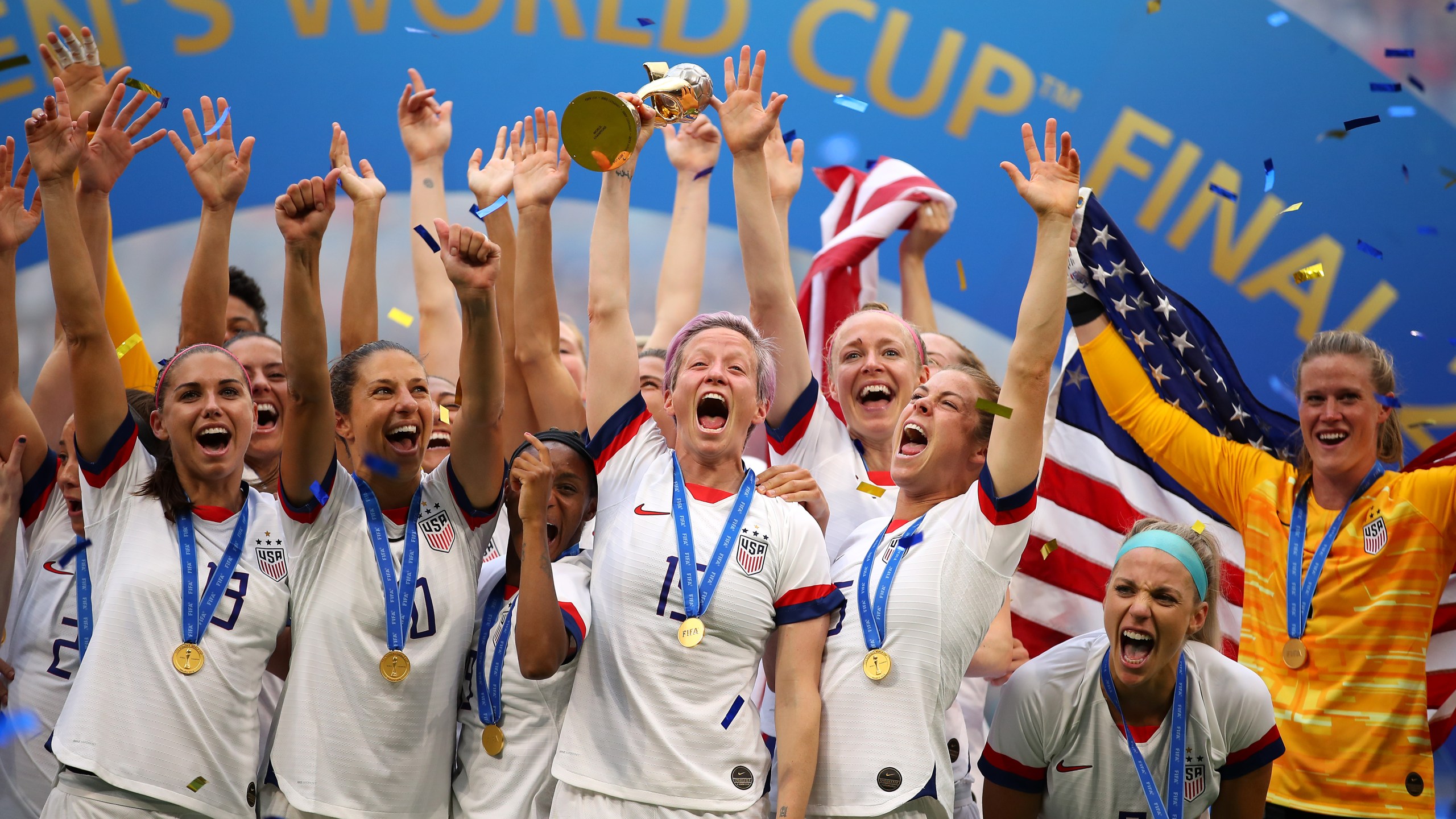 Megan Rapinoe lifts the trophy as the U.S. Women’s National Soccer Team celebrates their victory during the 2019 FIFA Women's World Cup final match between the U.S. and the Netherlands on July 7, 2019, in Lyon, France. (Richard Heathcote/Getty Images)